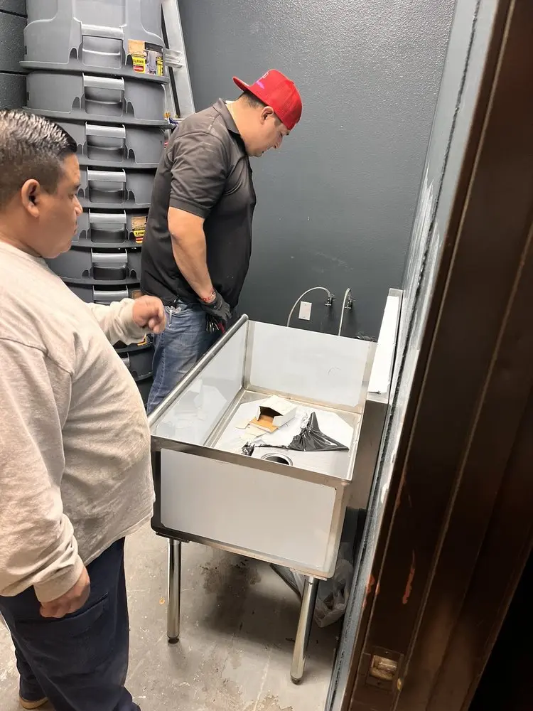 Commercial plumbing and sink installation in Conroe