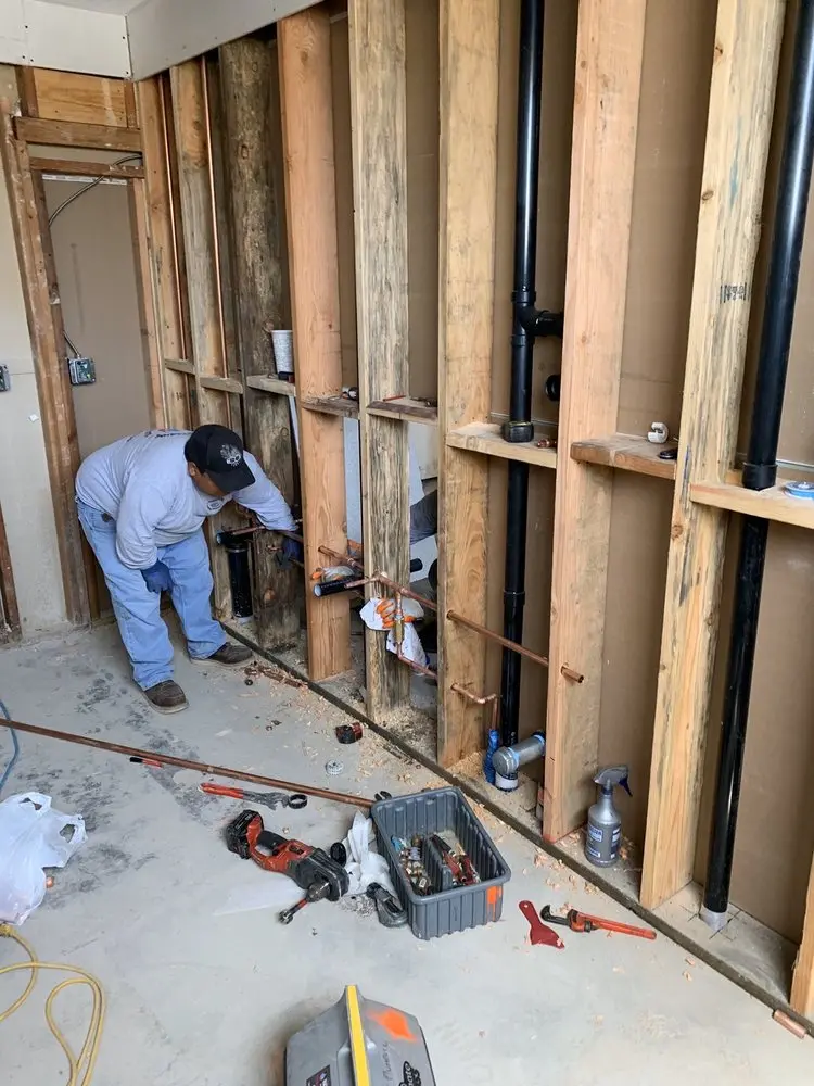 Commercial rough-in plumbing for Water Heater Replacement in Conroe